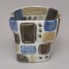 "Hawaiian" cup, slip cast porcelain with sgraffito decoration.